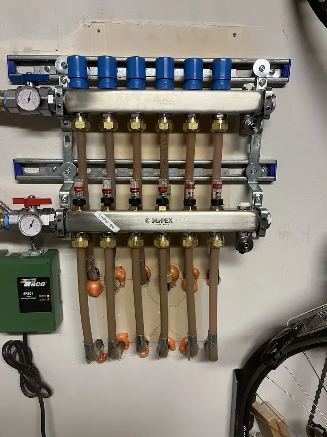 Plumber performing Gas Line Installation at a residential property in Gaines